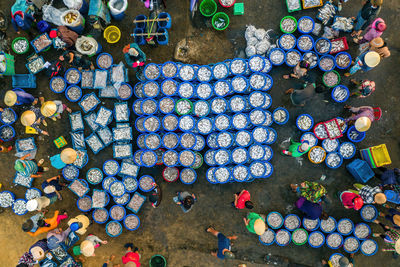 High angle view of people for sale in market