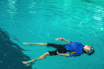 Man swimming in sea