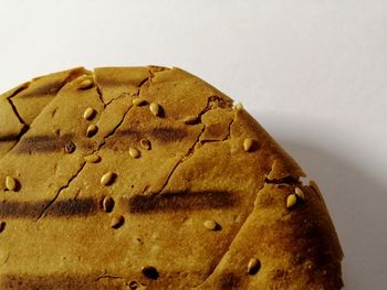 Close-up of cake against white background