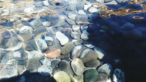 High angle view of stones on beach