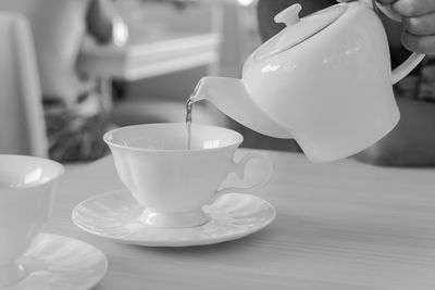 Close-up of coffee cup on table