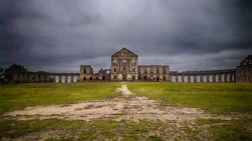 View of historical building against cloudy sky