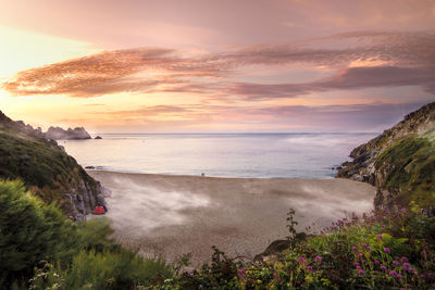 Scenic view of sea against sky during sunset