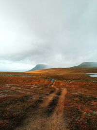 Scenic view of land against sky