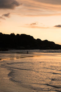 Scenic view of beach during sunset