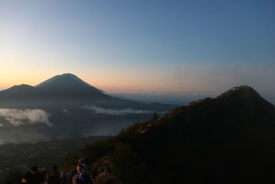 Scenic view of mountains against sky during sunset