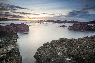 Scenic view of sea against sky during sunset