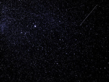 Low angle view of stars in dark sky