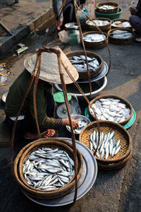 Woman selling fish at market