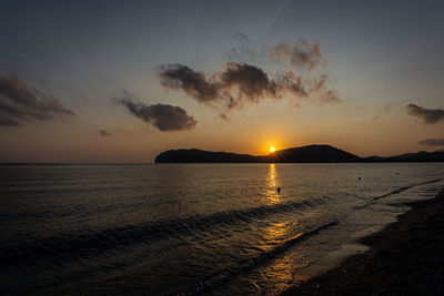 Scenic view of sea against sky during sunset