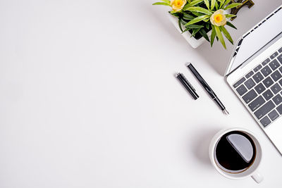 Directly above shot of coffee cup on table