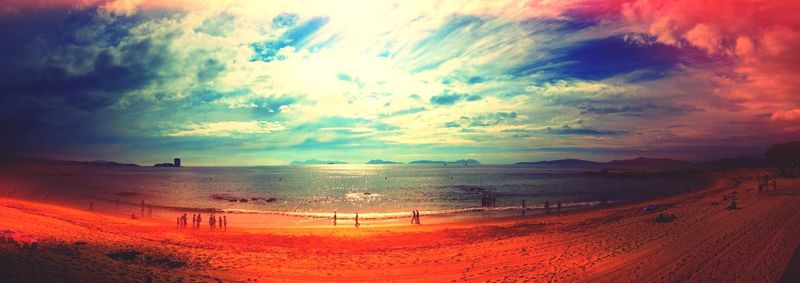 Scenic view of sea against cloudy sky