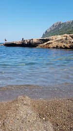 Scenic view of sea against clear sky