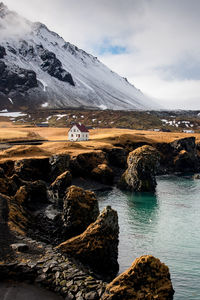 Scenic view of snowcapped mountains against sky