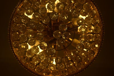 Low angle view of illuminated chandelier
