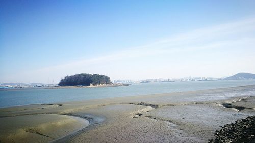 Scenic view of beach against sky