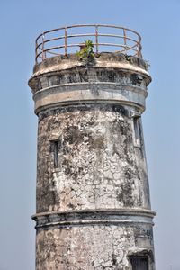 Low angle view of water tower against sky