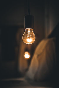 Close-up of illuminated light bulb