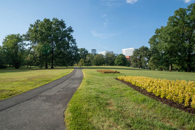 Scenic view of park against sky