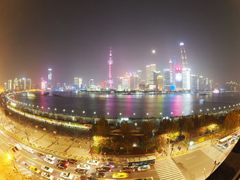 Illuminated buildings in city at night