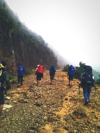 Tourists on mountain landscape