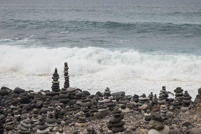 Scenic view of pebbles on beach