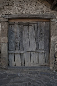 Built structure against brick wall