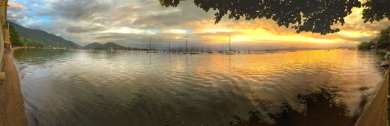 Scenic view of sea against dramatic sky