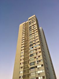Low angle view of modern building against clear sky