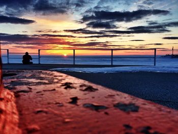 Silhouette of person standing on beach