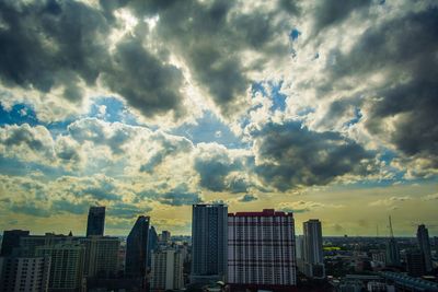 View of city against cloudy sky