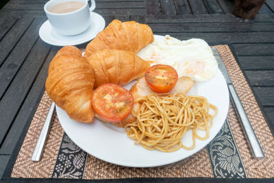 High angle view of breakfast served on table