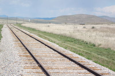 Railroad tracks on landscape