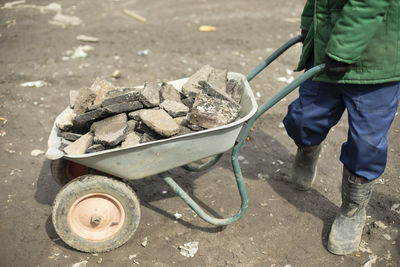 Low section of man working at construction site