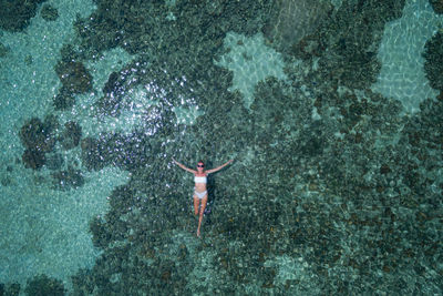 Woman swimming in sea