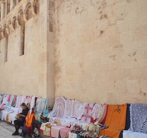 Woman sitting at market