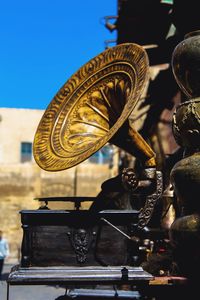 Gramophone outdoors against blue sky