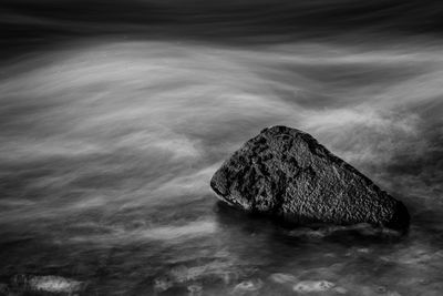 High angle view of rock in sea