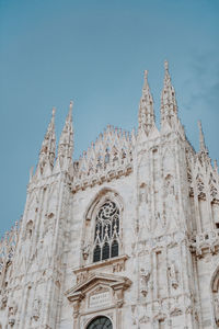 Low angle view of milan cathedral against clear sky