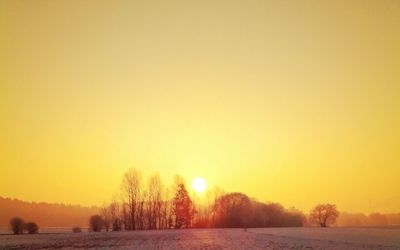 Scenic view of landscape at sunset