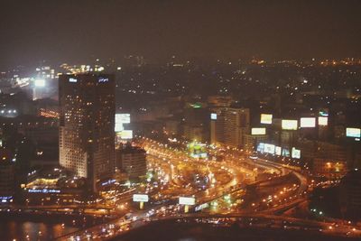 Illuminated cityscape at night