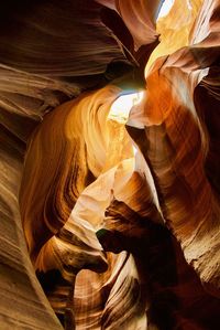 Low angle view of wave rock formation in canyon