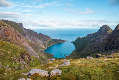 Scenic view of mountains and ocean against sky, lofoten, norway