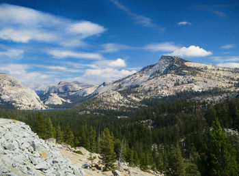 Scenic view of mountains against cloudy sky