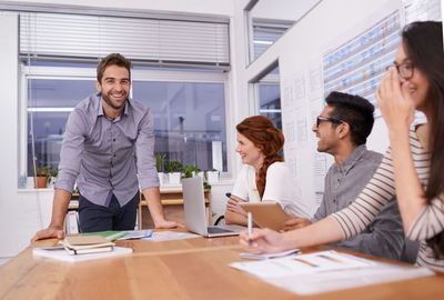 Business colleagues working in office