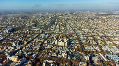 High angle view of cityscape by sea