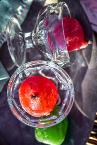 High angle view of strawberry in glass on table