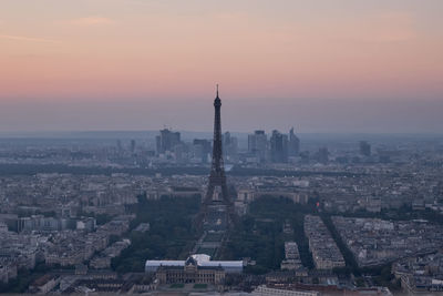 Cityscape against sky during sunset