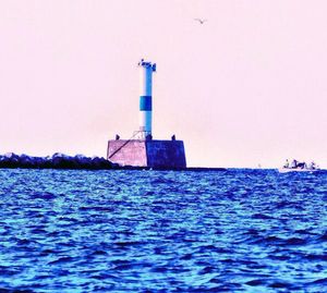 Scenic view of sea against blue sky