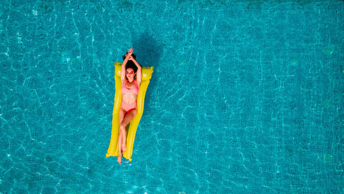 High angle view of person swimming in pool